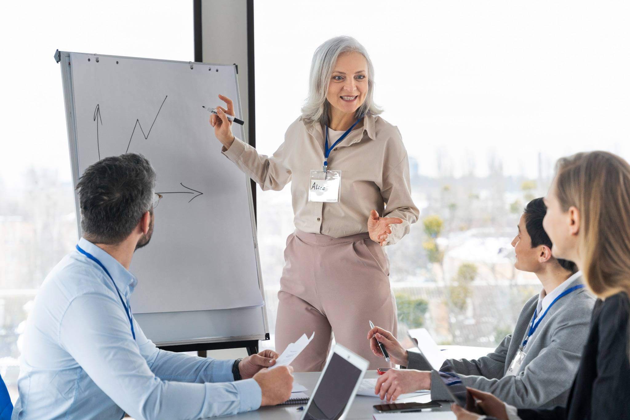 woman coaching employees